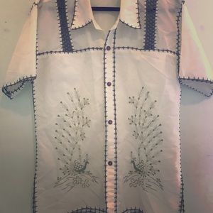 Vintage button up with peacock detail.